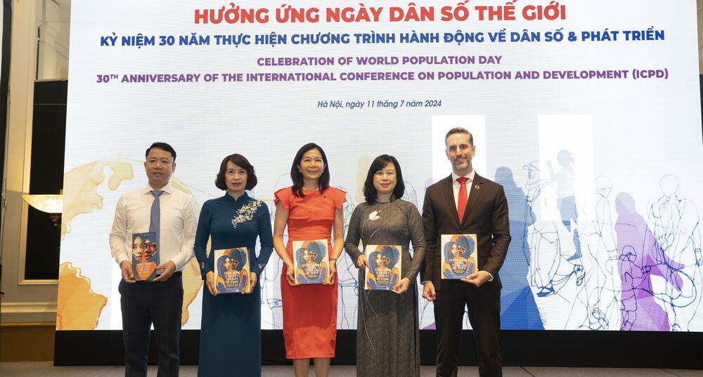  UN Resident Coordinator in Viet Nam Pauline Tamesis and Mr. Matt Jackson at the Celebration of World Population Day - 30th Anniversary of the International Conference on Population and Development (ICPD)