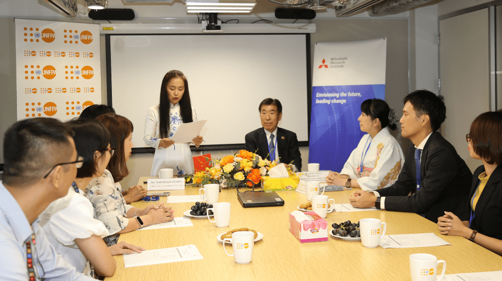 Ms. Naomi Kitahara giving a speech 