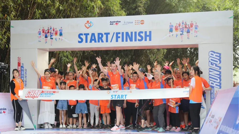 Young Vietnamese people participate in the Run to say NO to violence against women and girls 